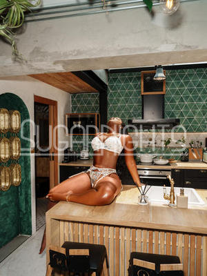 Candace Campbell posing in white lingerie in Columbus, Ohio